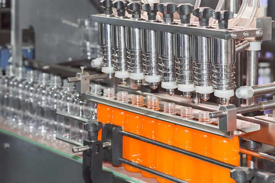 Filling and packaging machines and lines